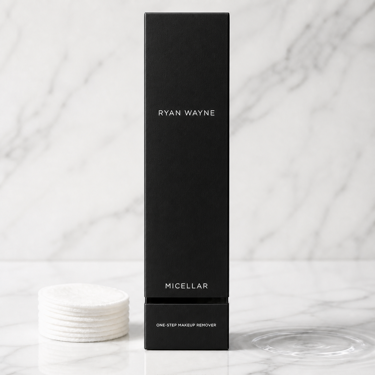 Ryan Wayne Micellar One-Step Makeup Remover in black packaging on white marble