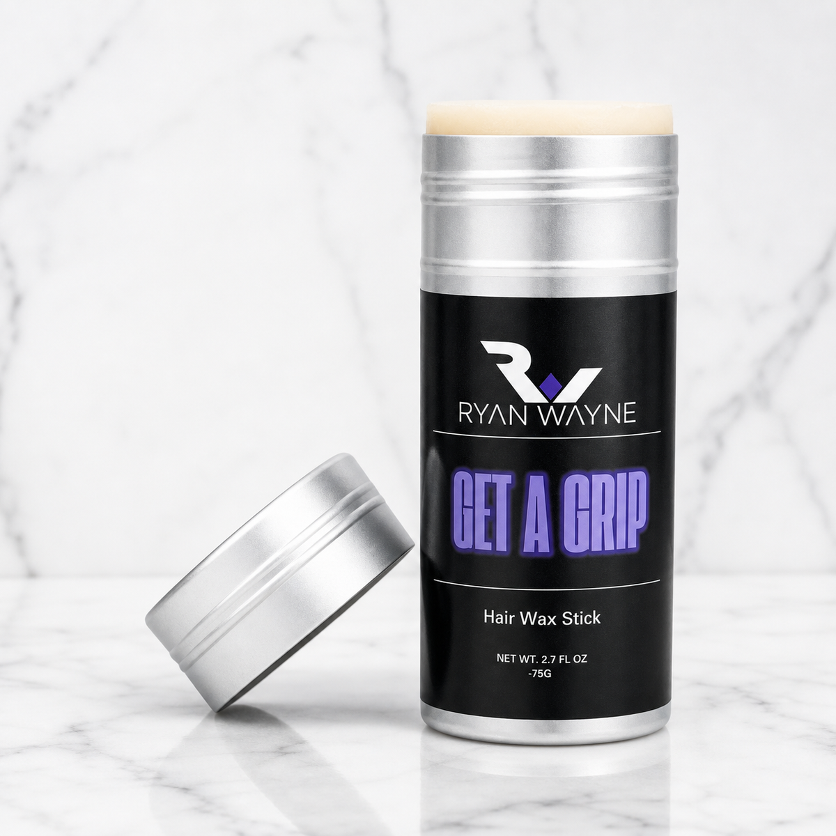 Ryan Wayne Get a Grip Smoothing Wax Stick on white marble